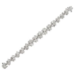 Pear and Baguette-Cut Diamond Platinum Rose Stem Flower Bracelet