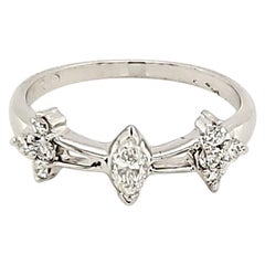 Pear and Round Cut White Diamond and Gold Ring