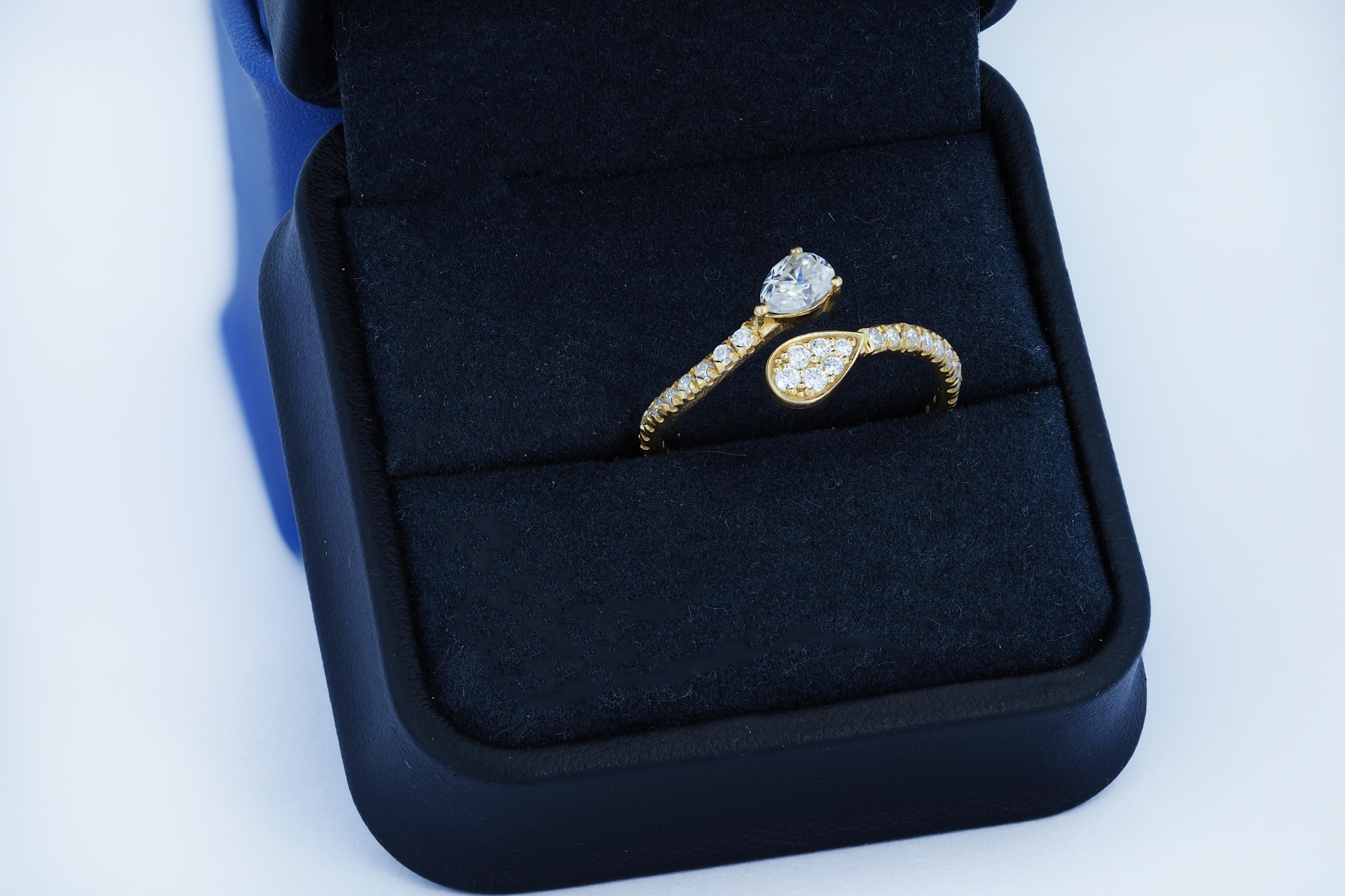For Sale:  Pear and round diamond cut moissanite open ended 14k gold ring 4