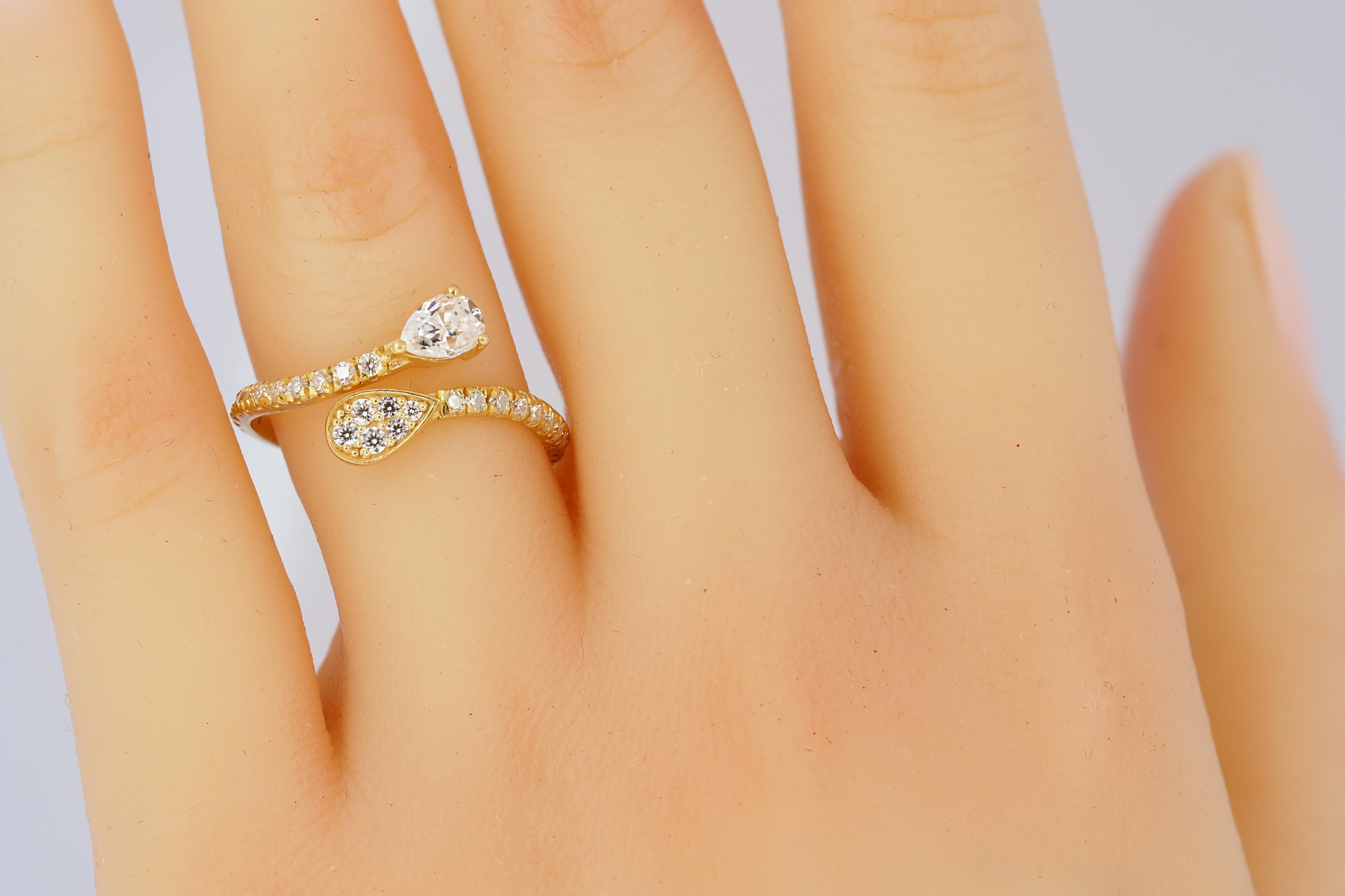 For Sale:  Pear and round diamond cut moissanite open ended 14k gold ring 6