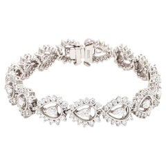 Bracciale multipietra con pera e diamante rotondo