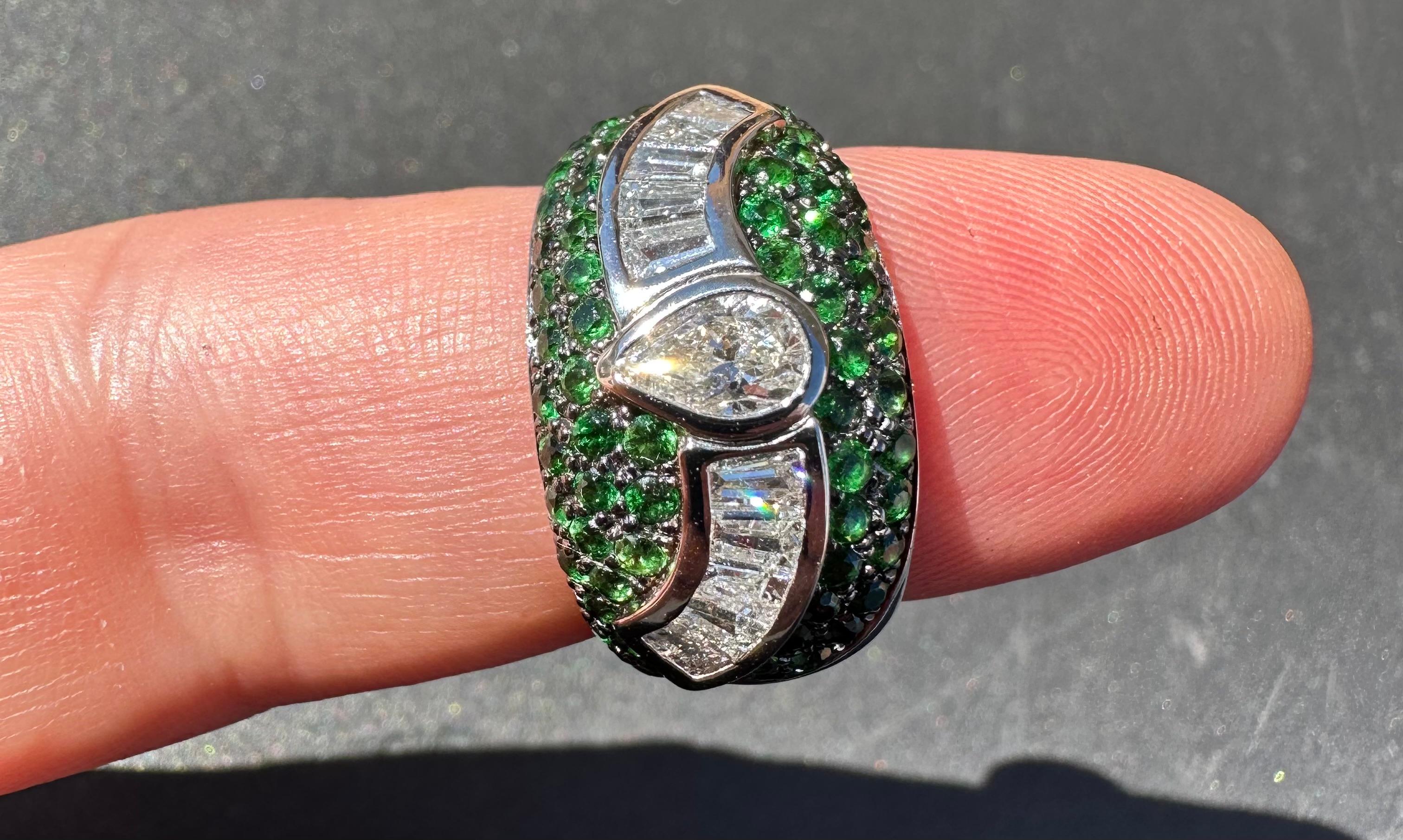 Contemporary Pear and Trapezoid Cut Diamond and Tsavorite Cocktail Ring set in White Gold  For Sale
