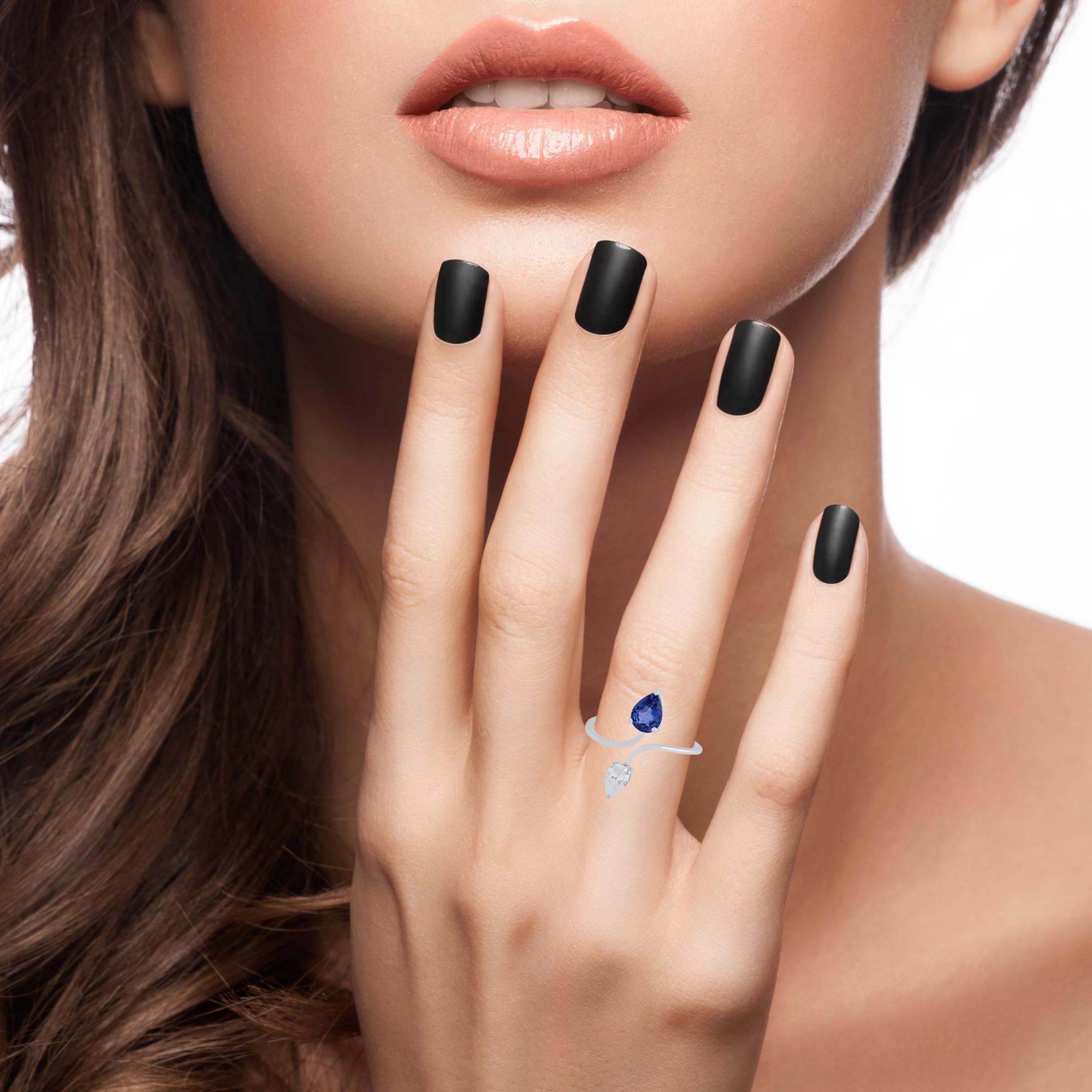 En vente :  Bague manchette en or blanc 18 carats avec saphir bleu en forme de poire et diamant 4
