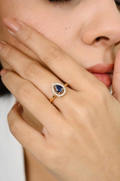 Pear Blue Sapphire Round Diamond Halo Engagement Ring Gift in 18k Yellow Gold