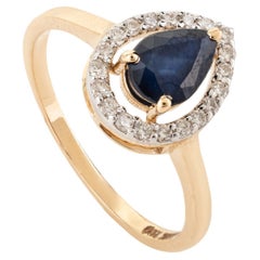 Bague de fiançailles Halo en or jaune 18 carats avec saphir bleu poire et diamant rond