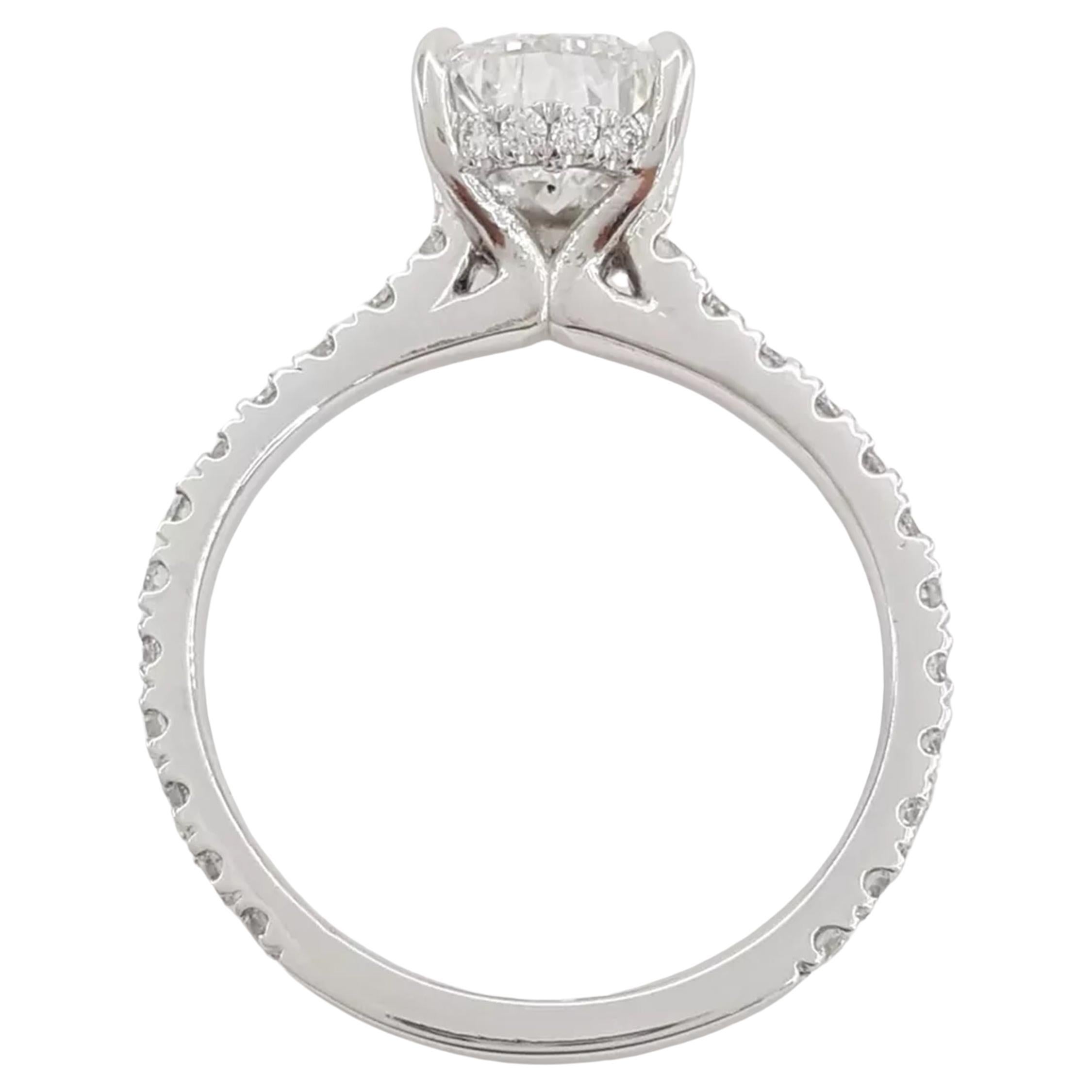 Contemporary Pear Brilliant Cut Diamond Hidden Halo Engagement Ring For Sale