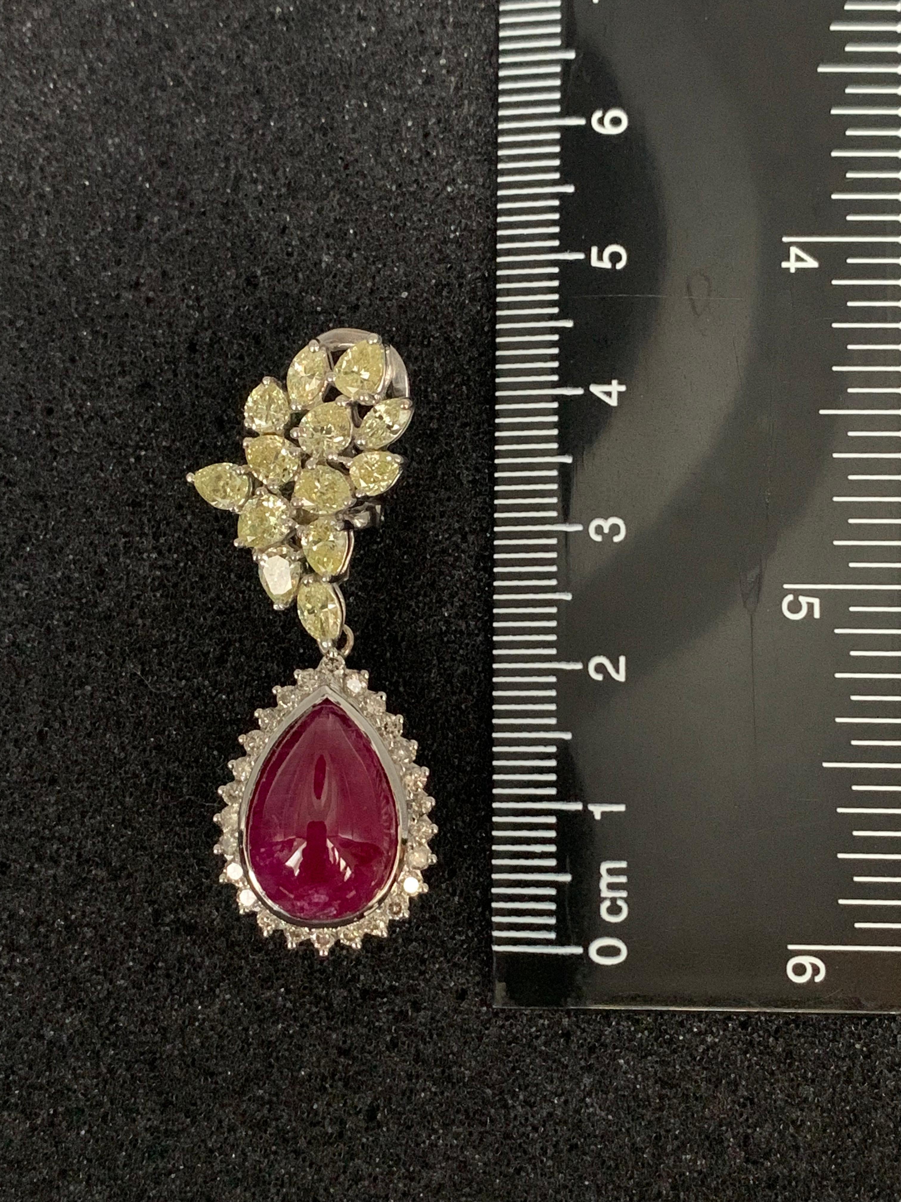 Women's Pear Cabochon Cut Ruby and Light Yellow Diamond Earrings For Sale