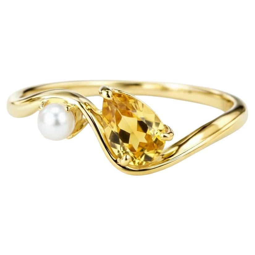 Anillo de oro de 14k con perla y citrino pera
