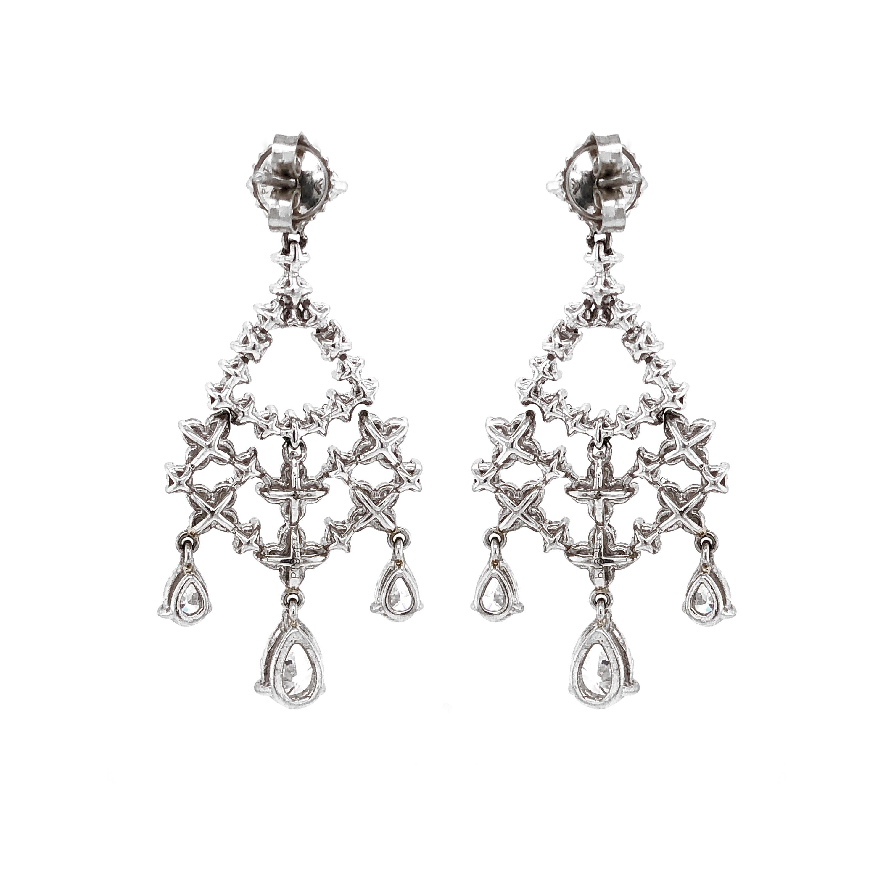 Contemporary Pear Cut and Round Diamonds 5.32 Carat Platinum Earrings For Sale