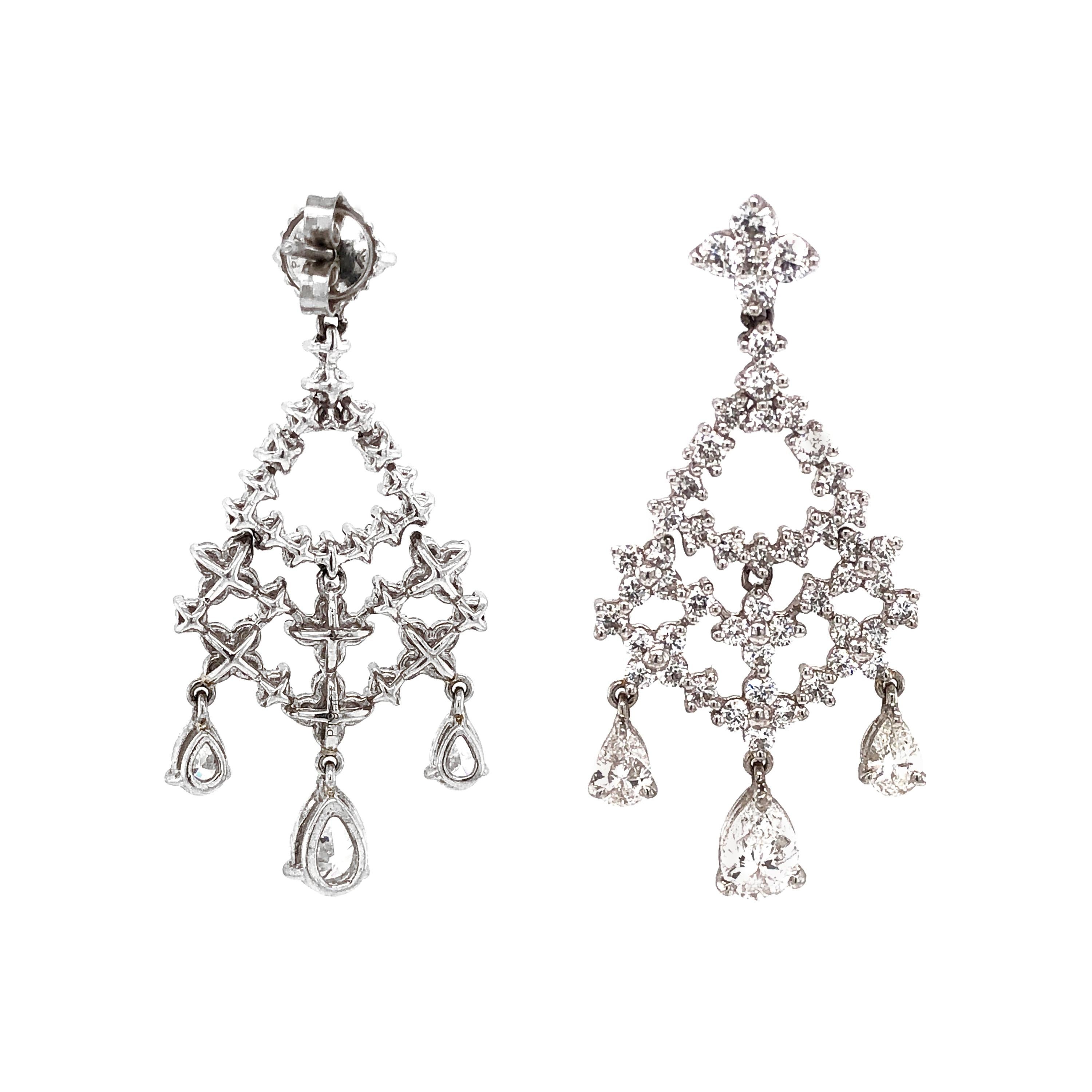 Pear Cut and Round Diamonds 5.32 Carat Platinum Earrings For Sale