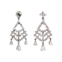 Pear Cut and Round Diamonds 5.32 Carat Platinum Earrings