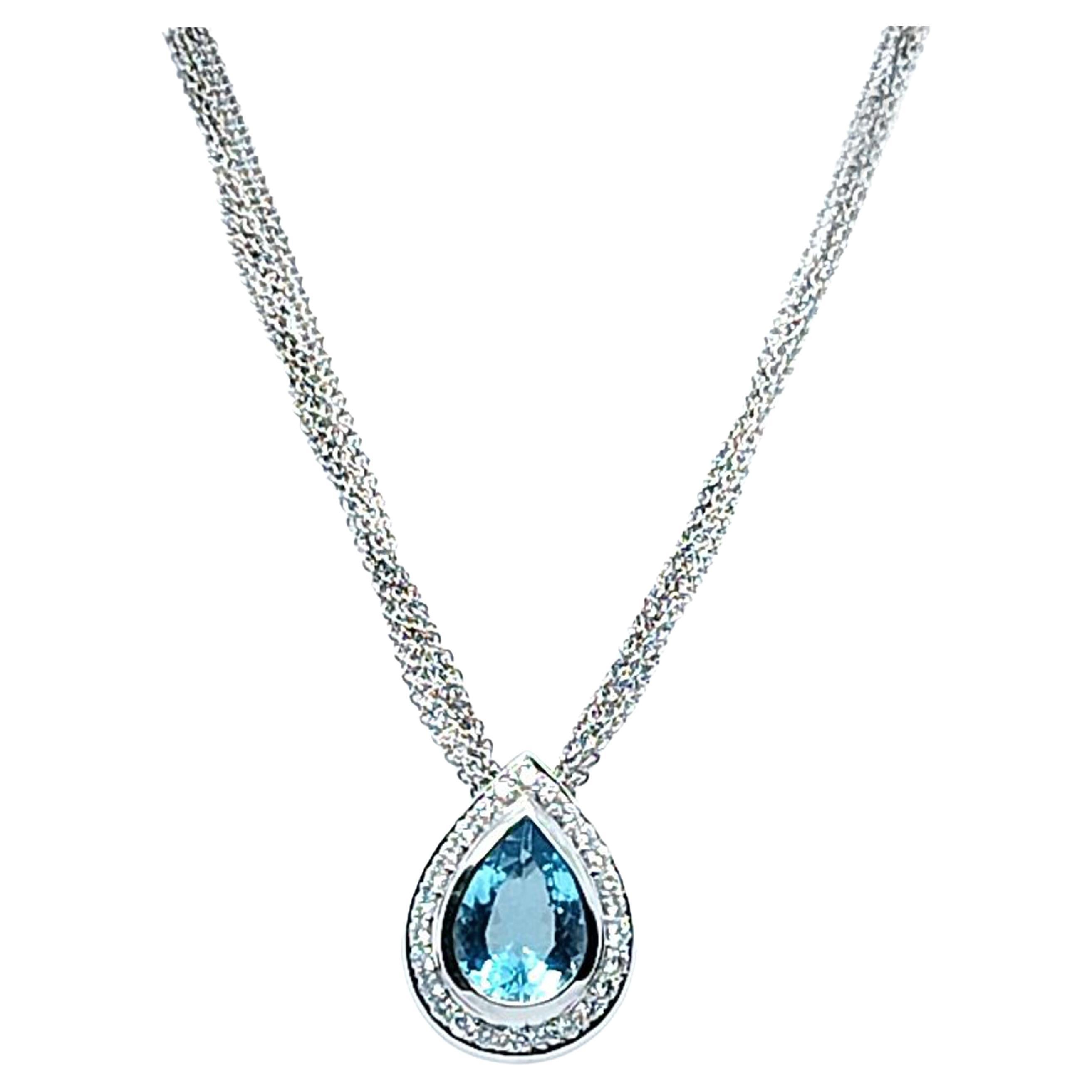 Pear Cut Aquamarine and Diamond Pendant Necklace For Sale