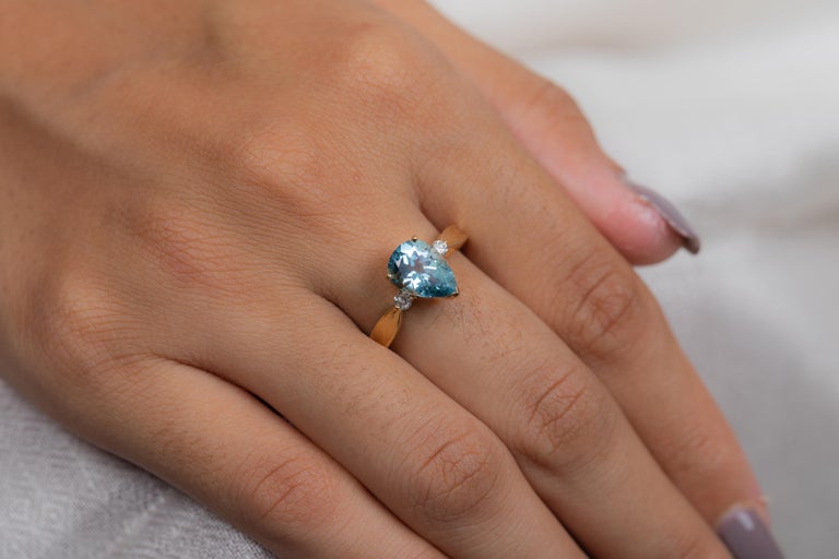 For Sale:  Pear Cut Aquamarine and Diamond Three Stone Engagement Ring in 14K Yellow Gold  2