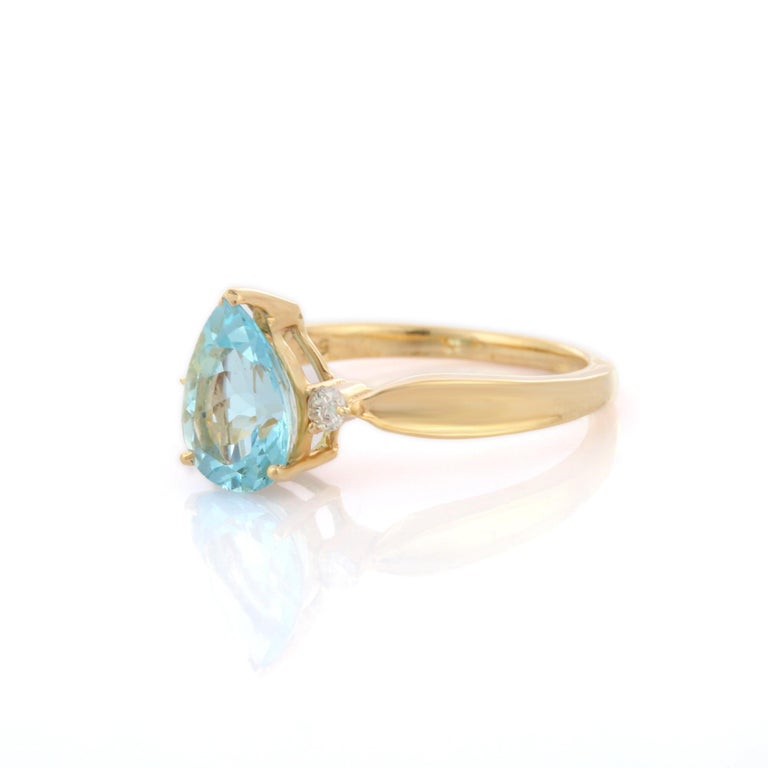 For Sale:  Pear Cut Aquamarine and Diamond Three Stone Engagement Ring in 14K Yellow Gold  3