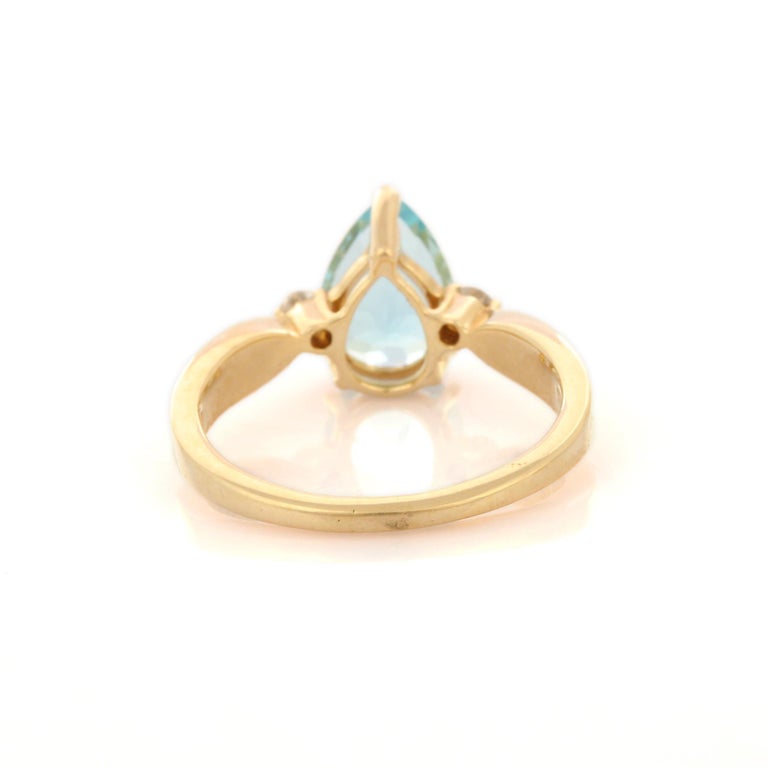 For Sale:  Pear Cut Aquamarine and Diamond Three Stone Engagement Ring in 14K Yellow Gold  5
