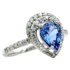 Halo-Ring aus 18 Karat Weißgold mit blauem Ceylon-Saphir im Birnenschliff und Diamanten