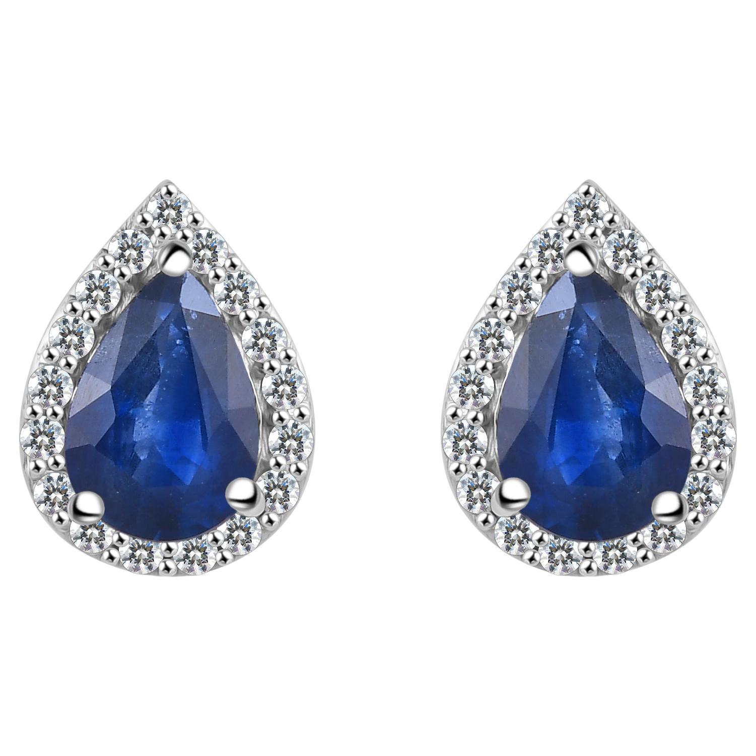 Pendientes de oro blanco macizo de 14k con halo de diamantes y zafiro azul talla pera