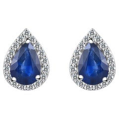 Blauer Saphir im Birnenschliff Diamant-Halo-Ohrstecker aus massivem 14k Weißgold