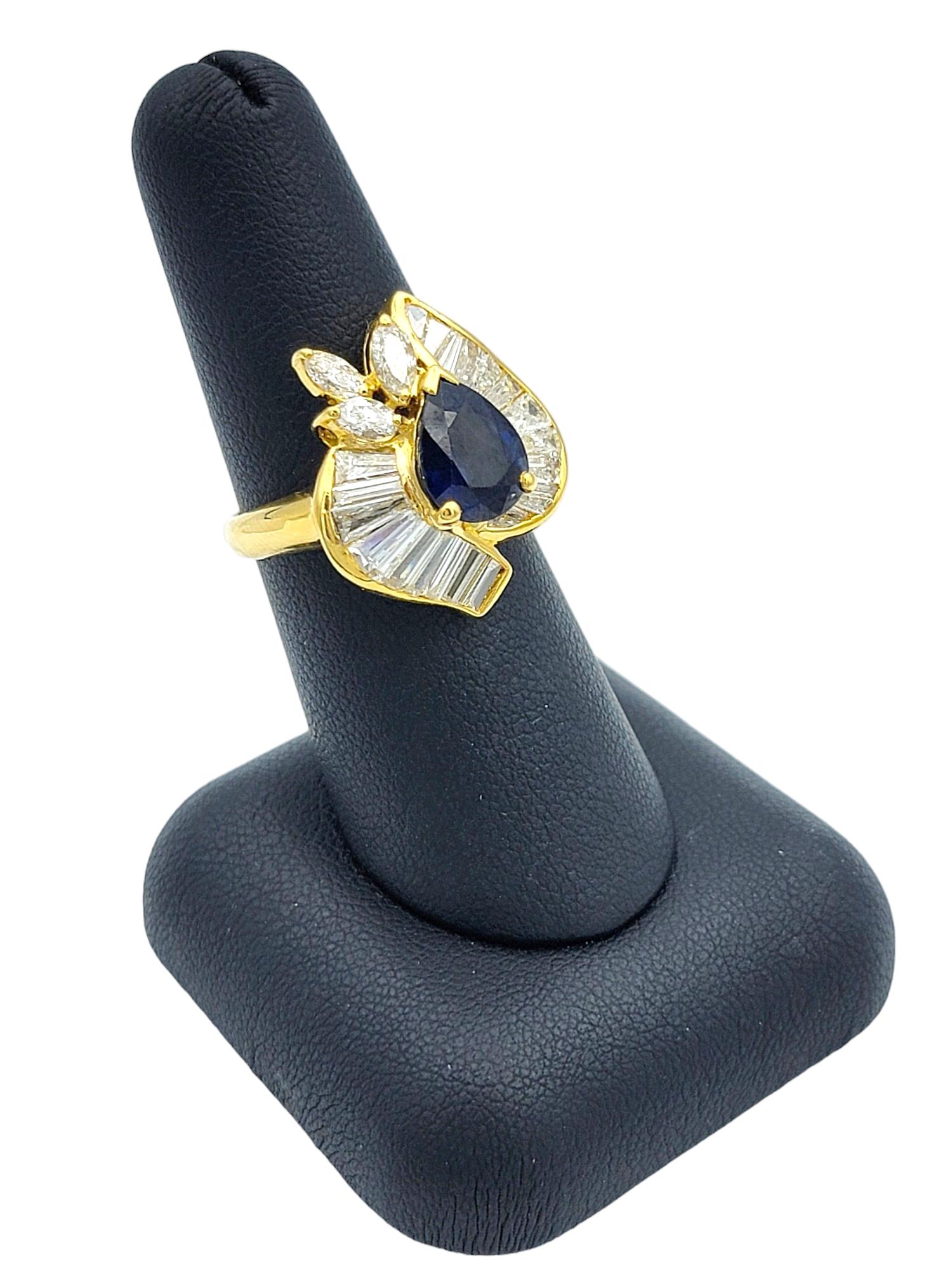 Pear Cut Blue Sapphire Ring with Baguette and Marquise Diamonds in 18 Karat Gold 5