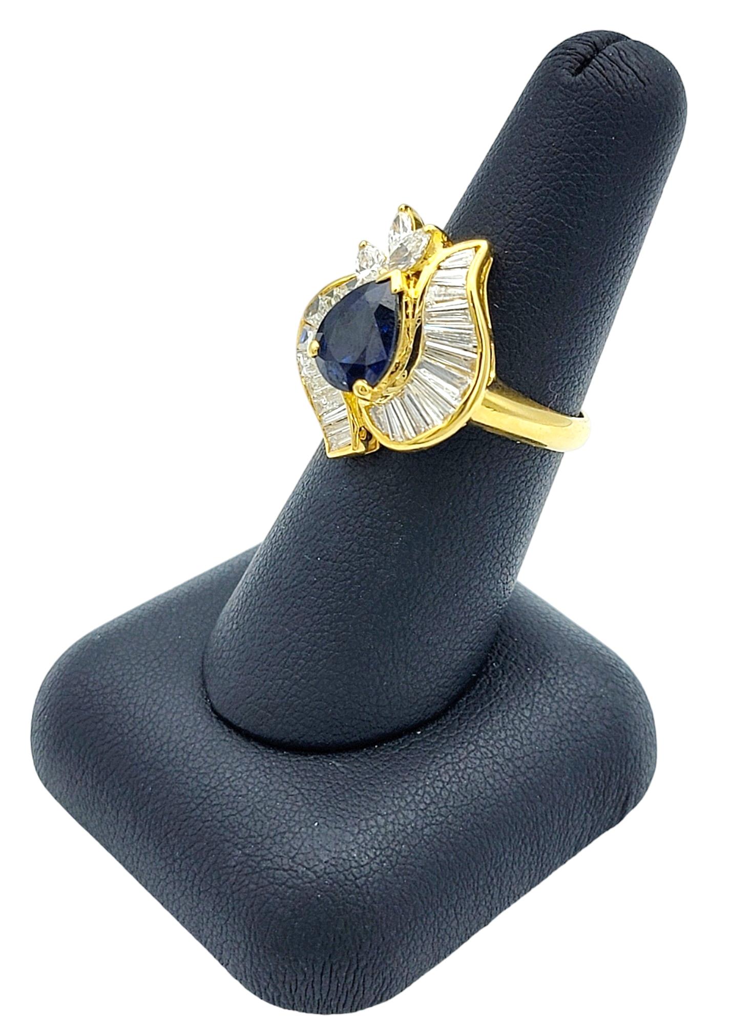 Pear Cut Blue Sapphire Ring with Baguette and Marquise Diamonds in 18 Karat Gold 6