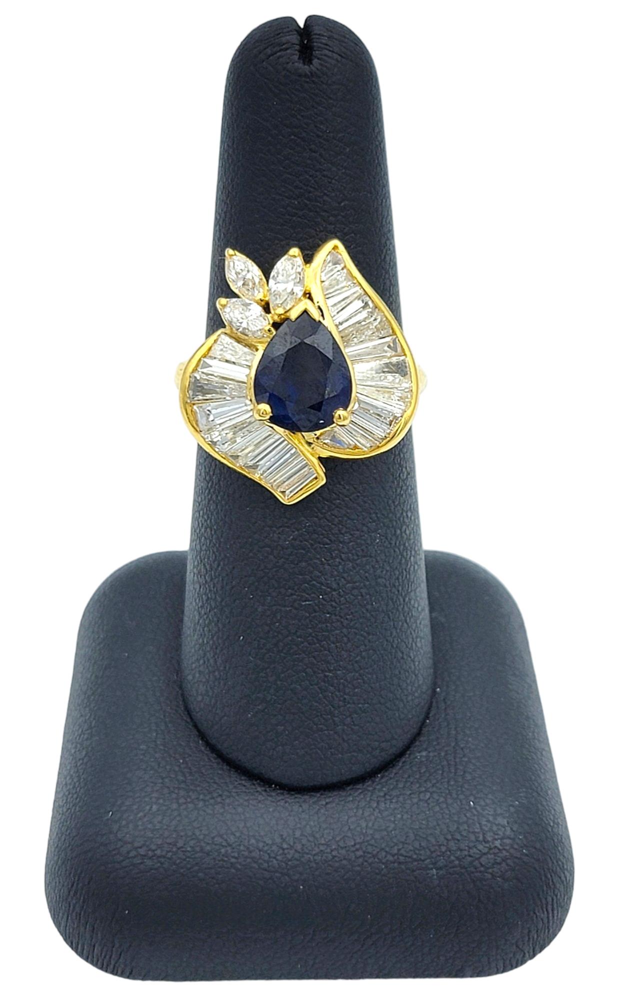 Pear Cut Blue Sapphire Ring with Baguette and Marquise Diamonds in 18 Karat Gold 4