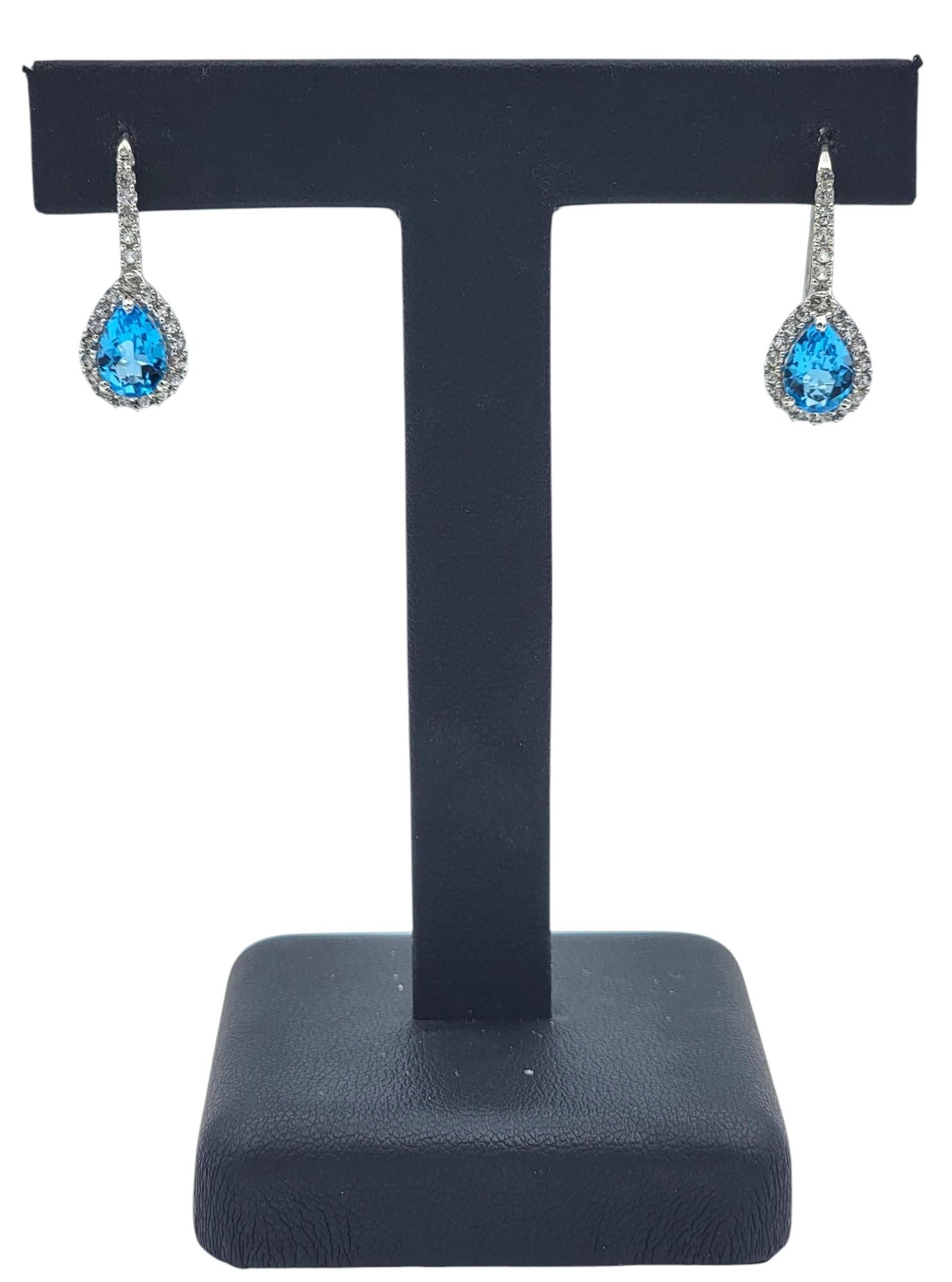 Pear Cut Blue Topaz and White Sapphire Halo Drop Earrings in 14 Karat White Gold For Sale 3