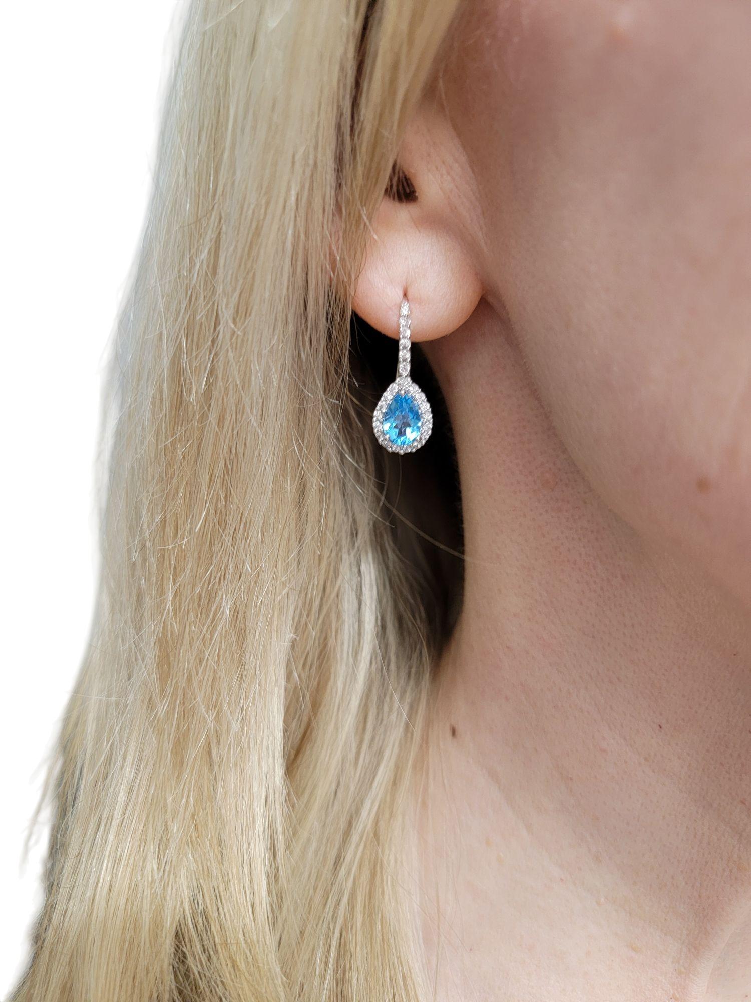 Pear Cut Blue Topaz and White Sapphire Halo Drop Earrings in 14 Karat White Gold For Sale 4