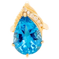 Anillo Topacio Azul Corte Pera Engaste Diamante 9 Quilates Oro Amarillo 14K