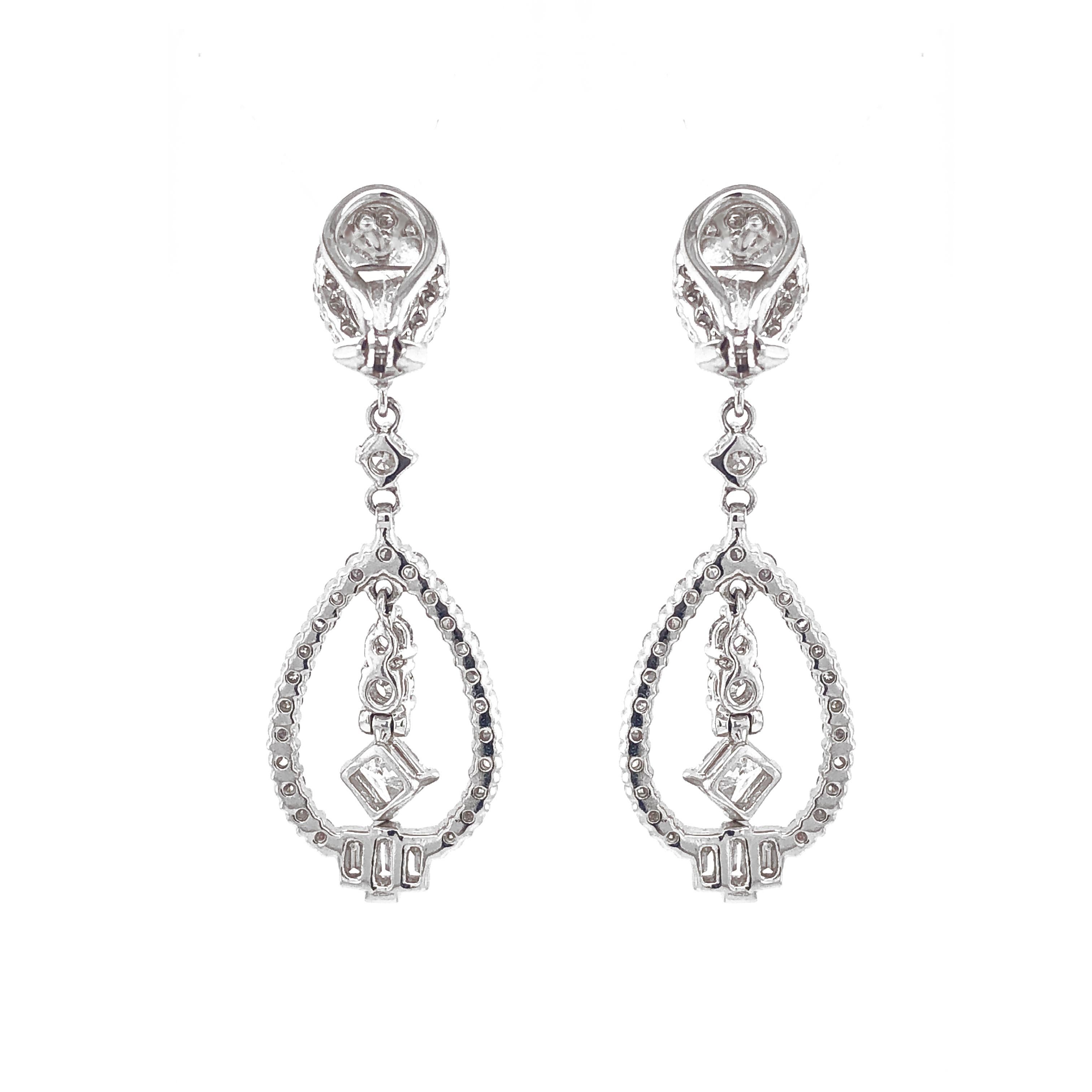 Contemporary Pear Cut Center Diamond 1.20 Carat Drop Dangling Platinum Earrings For Sale