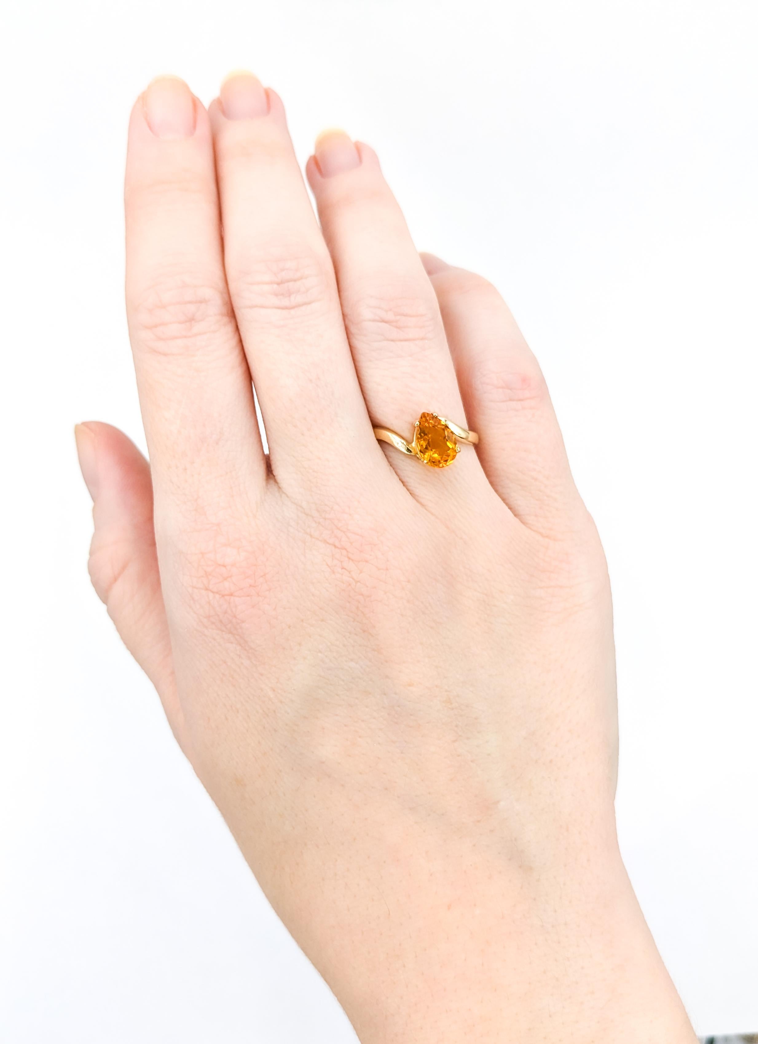 Pear-Cut Citrine Ring in Gold 

Introducing this cute citrine ring, crafted in 14K Yellow Gold. At its heart lies a stunning 9x6mm Pear Cut Citrine with a captivating orange color. The ring, presented in size 6, can be resized to your specifications
