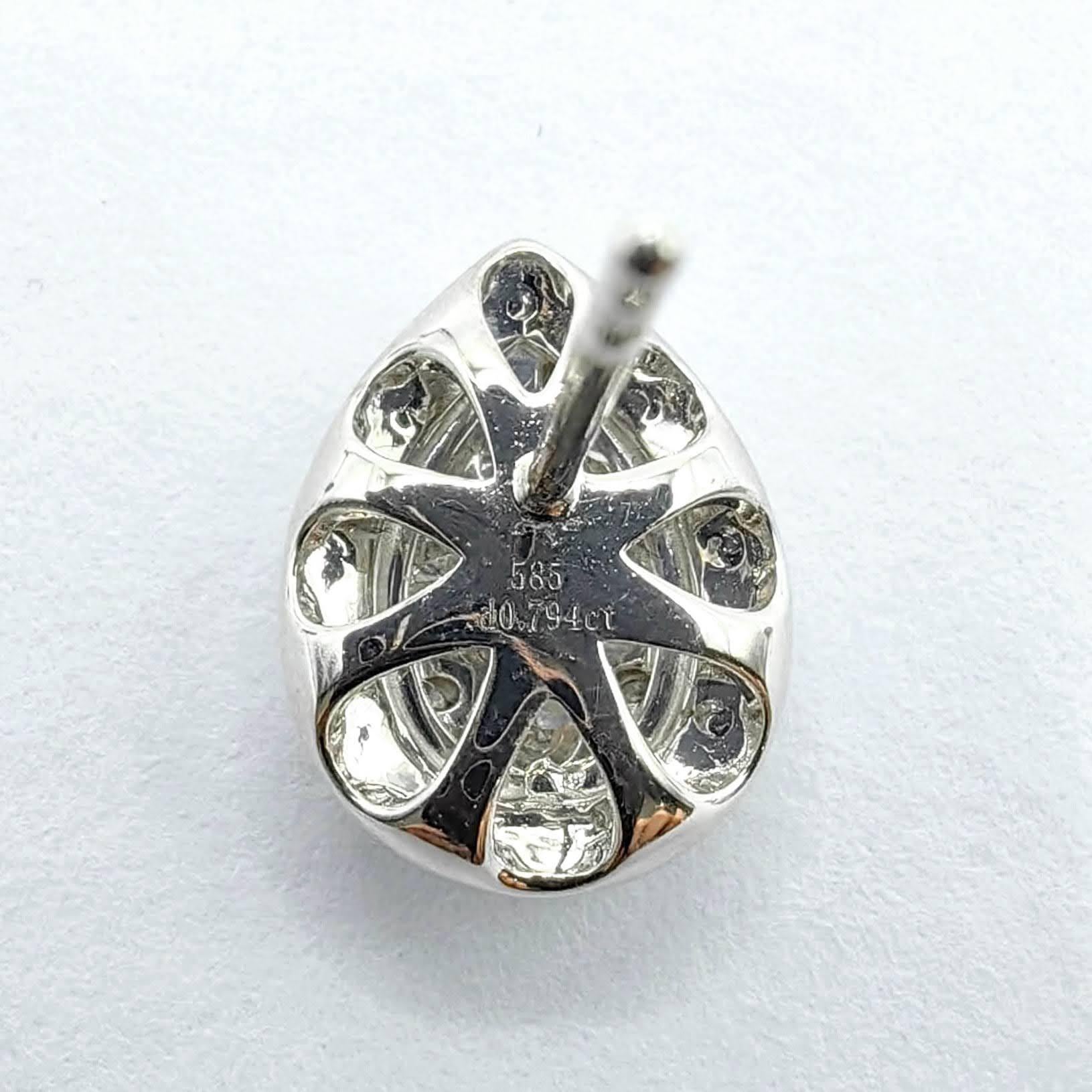 Pendientes de oro blanco de 14 quilates con halo ilusión y racimo de diamantes talla pera en venta 2