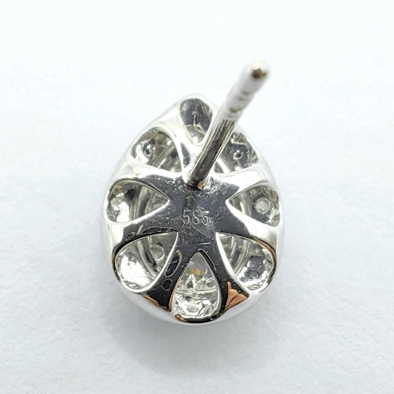 Pendientes de oro blanco de 14 quilates con halo ilusión y racimo de diamantes talla pera en venta 3