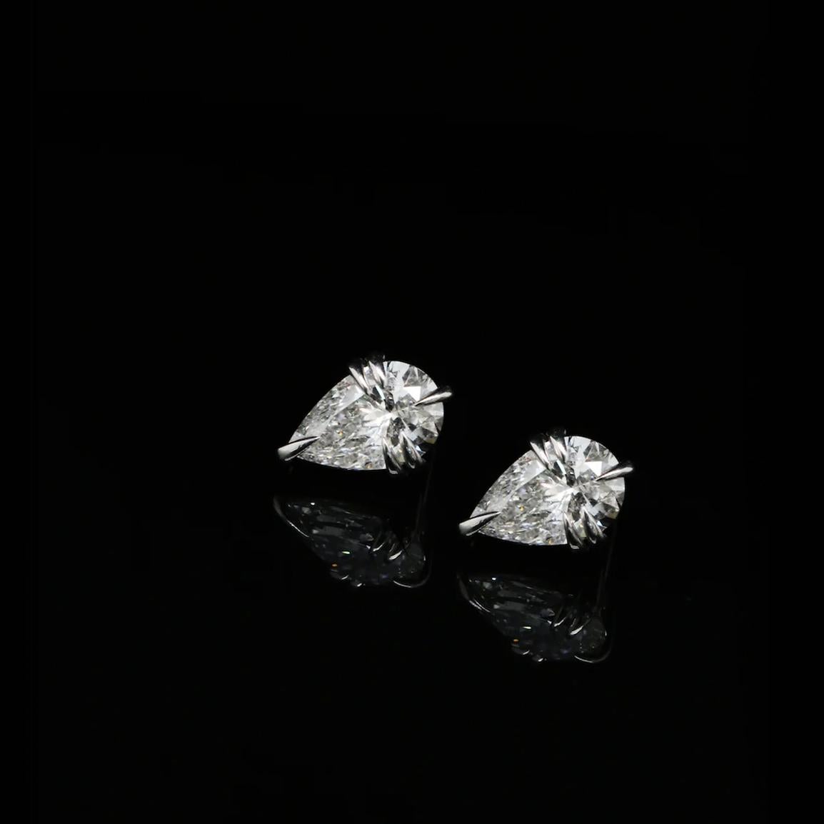 Ohliguer Icon Croc Studs with 4ct pear cut diamonds. These 18ct white gold earrings feature our talonistic claws and signature croc filagree providing your look with an iconic edge day and night. 

•High quality FSI natural diamonds 

• Pear cut 2 x