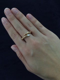 pear-cut diamond stylized bypass snake ring in 18kt rose gold