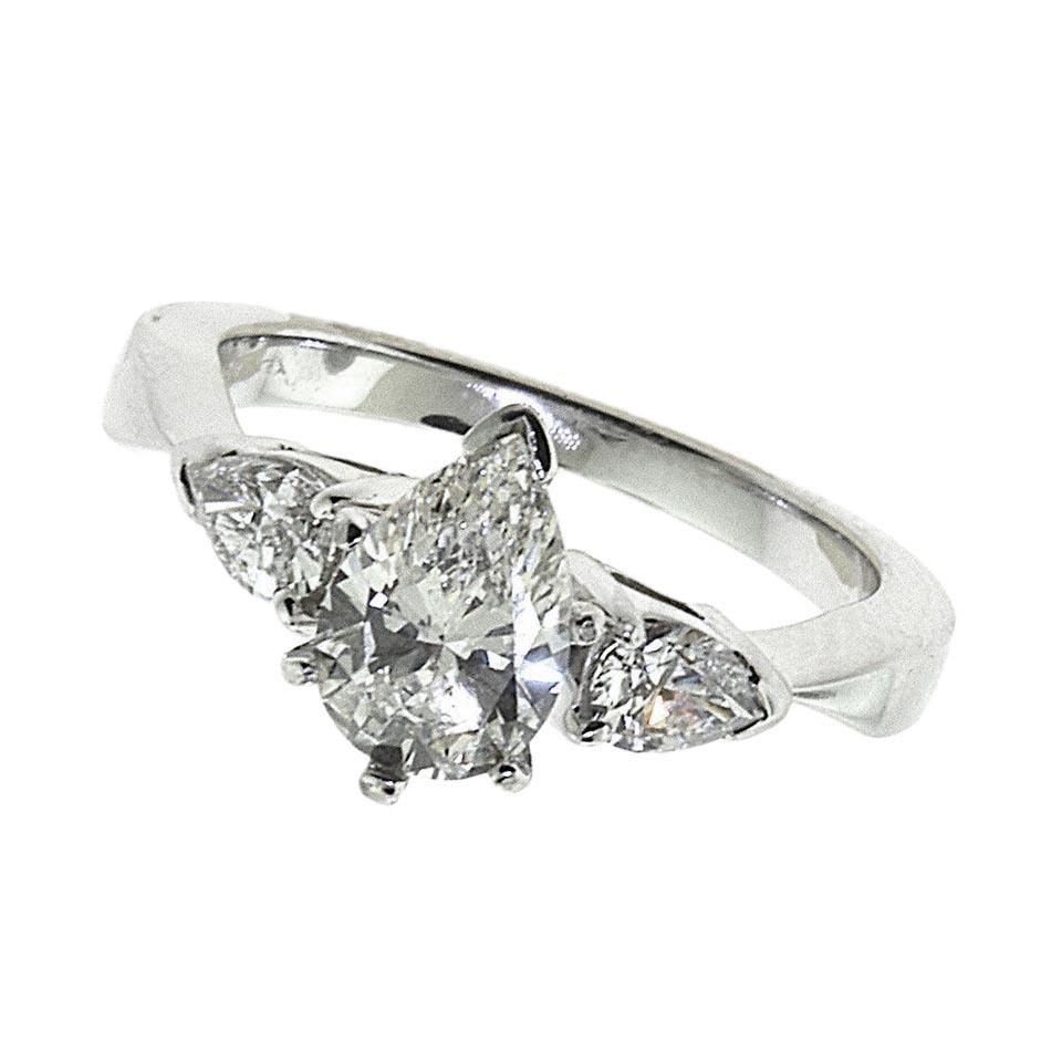 Style: Pear Shape Diamond Engagement Ring

Metal: White Gold

Metal Purity: 18k

Ring Size: 6 

Engagement Ring Center Stone:

Center Stone Carat Weight: 1.02 - 1.10 

Center Stone Dimensions:  

8.91mm length x 5.62 mm width x 3.80 mm depth  