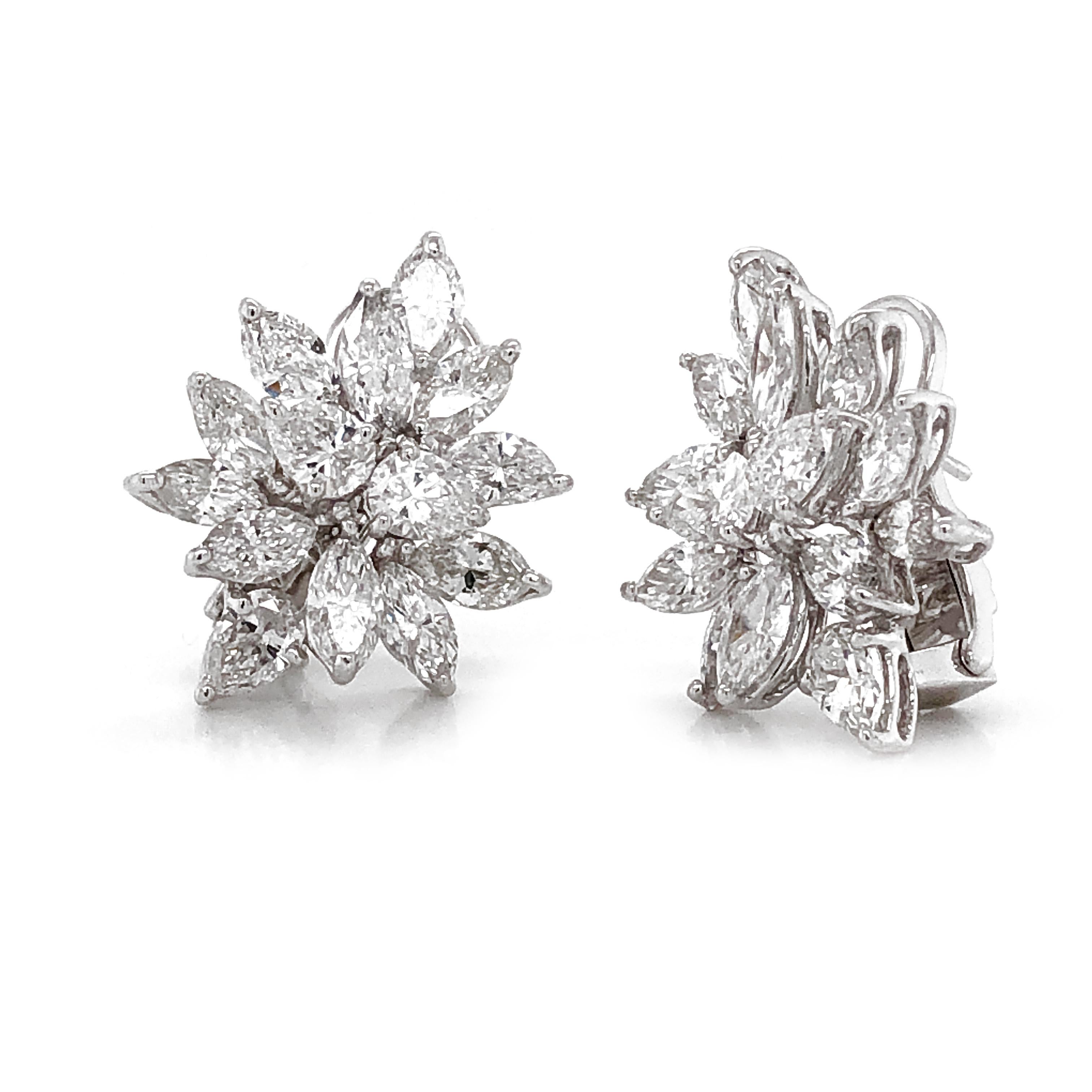Elegant diamond platinum earrings with a cluster of brilliant pear cut diamonds 10.63 carat total. 
Diamonds are white and natural and in G-H Color Clarity VS.
Platinum 950 metal.
French  Omega clips.
Contemporary elegant style.
Length: 2.5