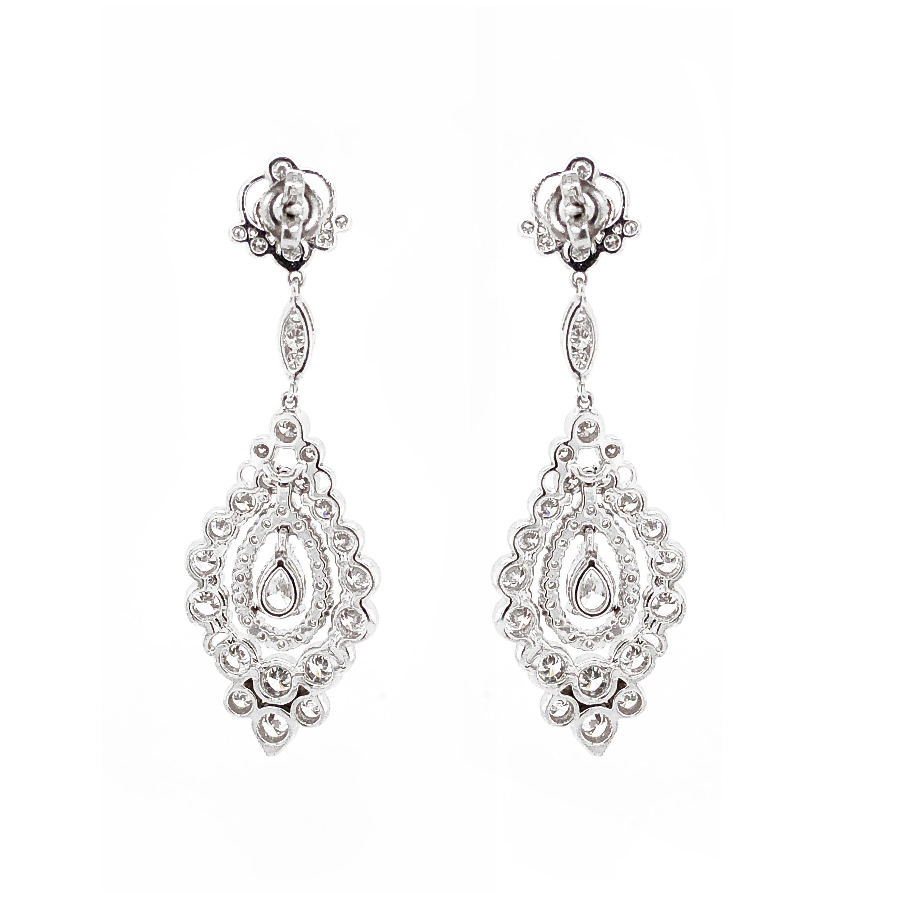 Pear Cut Diamond 1.12 Carat Round Diamonds 6.32 Carat Platinum Drop Earrings In New Condition For Sale In New York, NY
