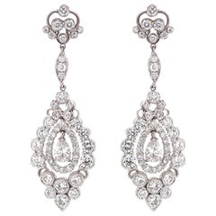 Pear Cut Diamond 1.12 Carat Round Diamonds 6.32 Carat Platinum Drop Earrings