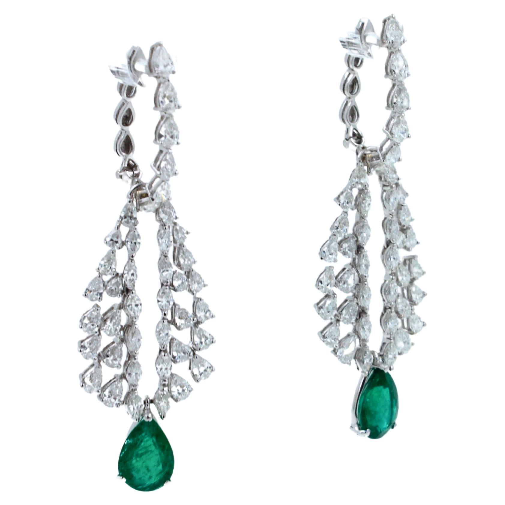 18K White Gold
11.66 grams weight
2.25 inches length 
3.00 cts G/VS Diamonds 
6 CTW Emeralds 
Emerald Color - Medium Mysterious Green with Lighter Hues, Especially in Light
