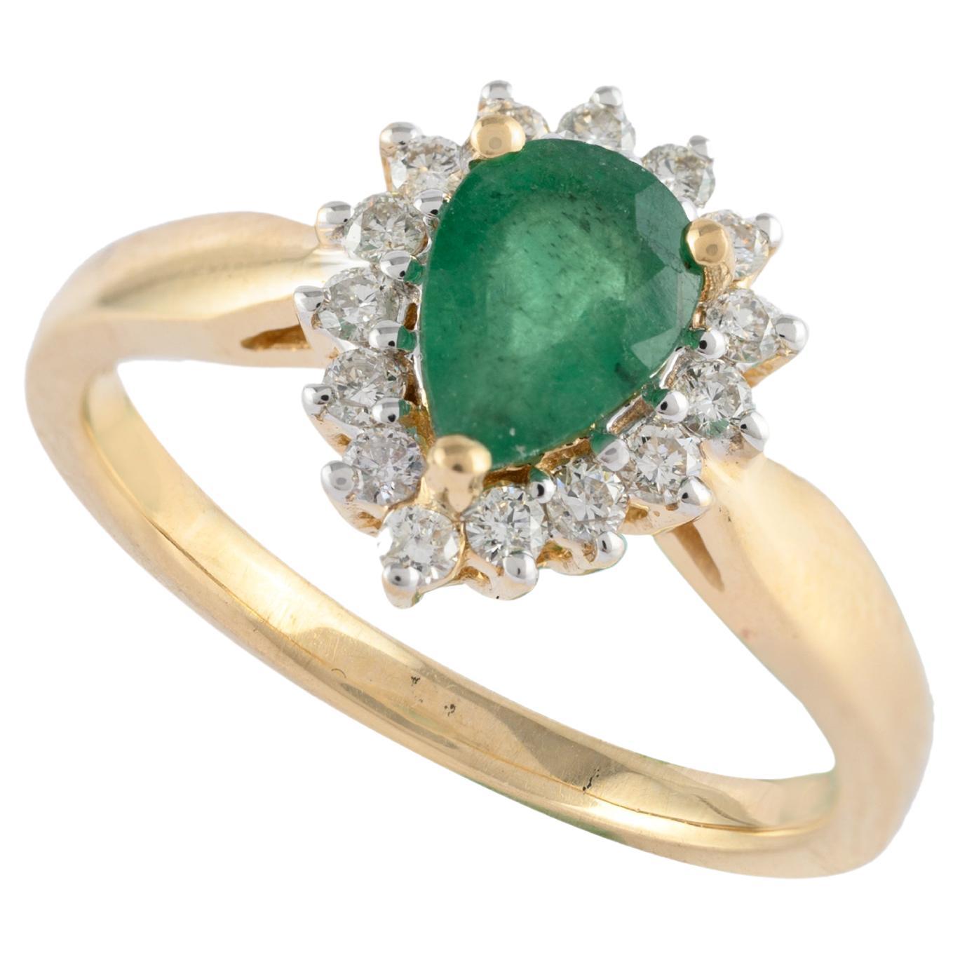 For Sale:  Pear Cut Emerald and Halo Diamond Wedding Ring Crafted in 14k Solid Yellow Gold