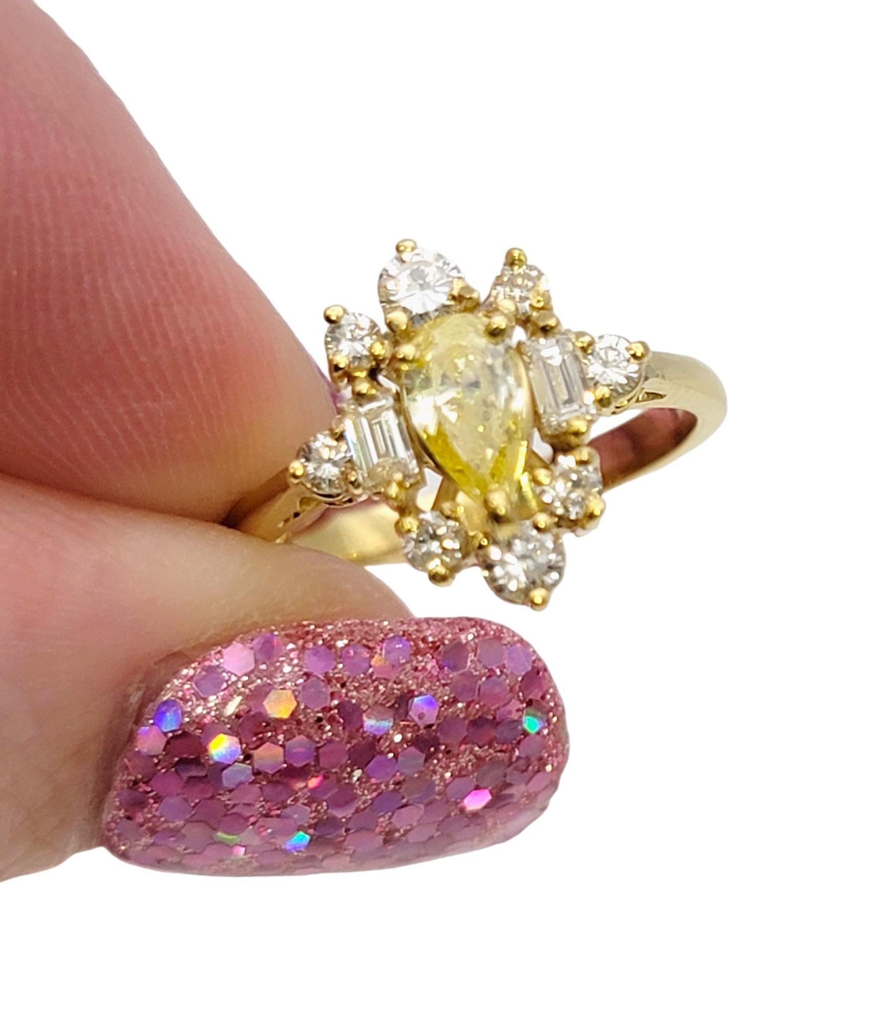Pear Cut Fancy Yellow Diamond Ring with White Diamond Accents 18 Karat Gold Band For Sale 3