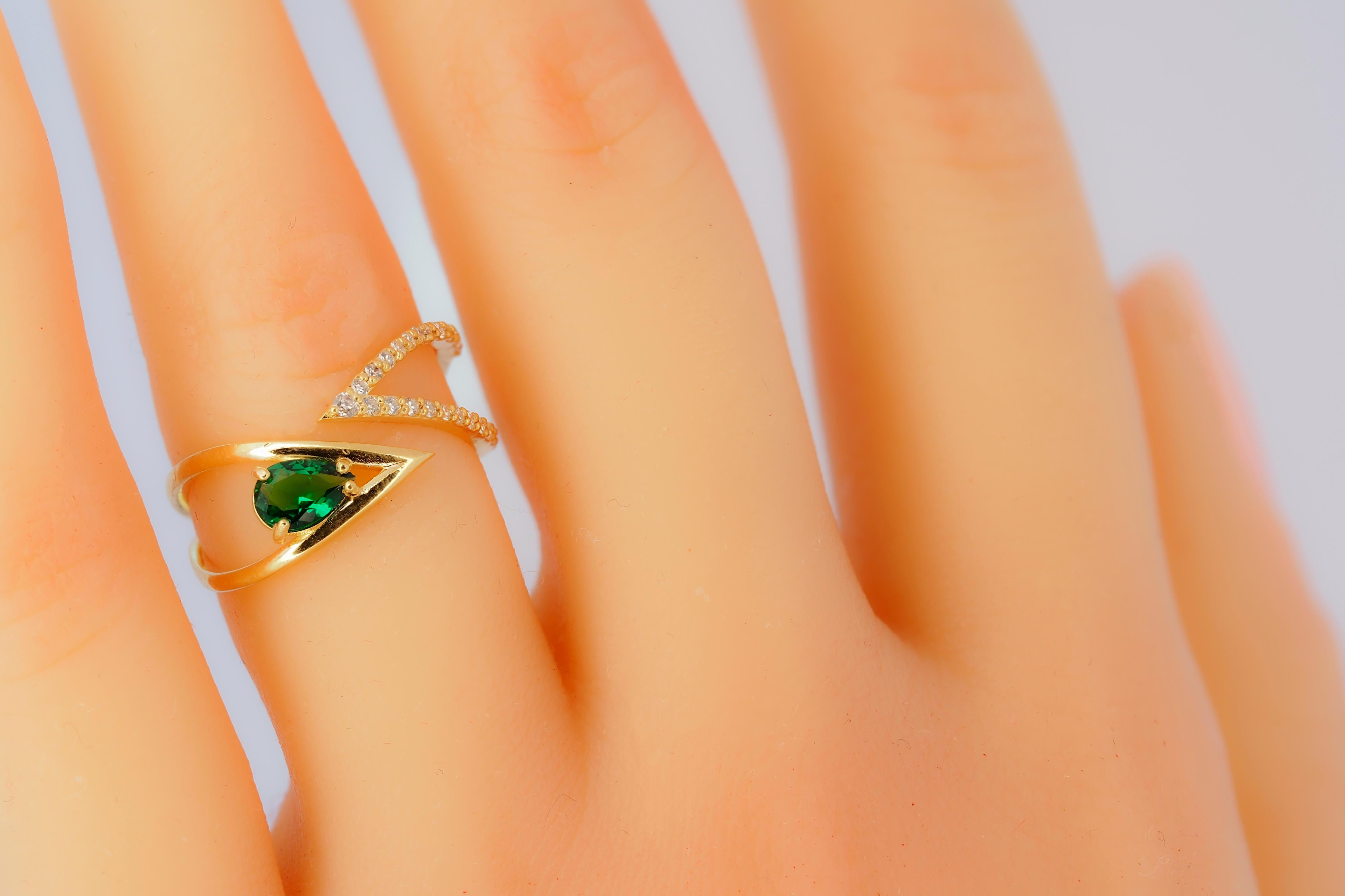 For Sale:  Pear cut lab emerald adjustable 14k gold ring. 7