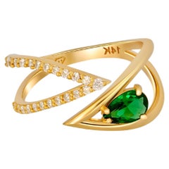 Pear cut lab emerald adjustable 14k gold ring.
