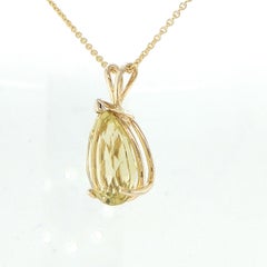 Pear cut lemon citrine pendant in yellow gold