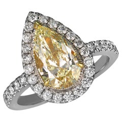 GIA Report Certified Pear Cut Light Yellow Diamond Ring