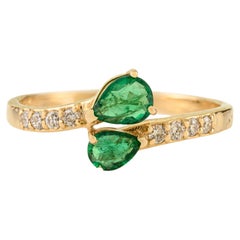 Bague bypass en or jaune 14 carats, émeraude naturelle taille poire et diamant Bijoux fins