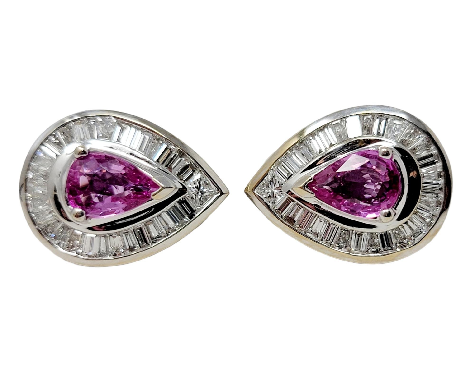 These incredible natural pink sapphire and diamond halo studs are absolutely gorgeous. The vibrant pink color of the sapphire really pops against the icy white diamonds, while the stones sparkle and shine from every angle. Each earring features a