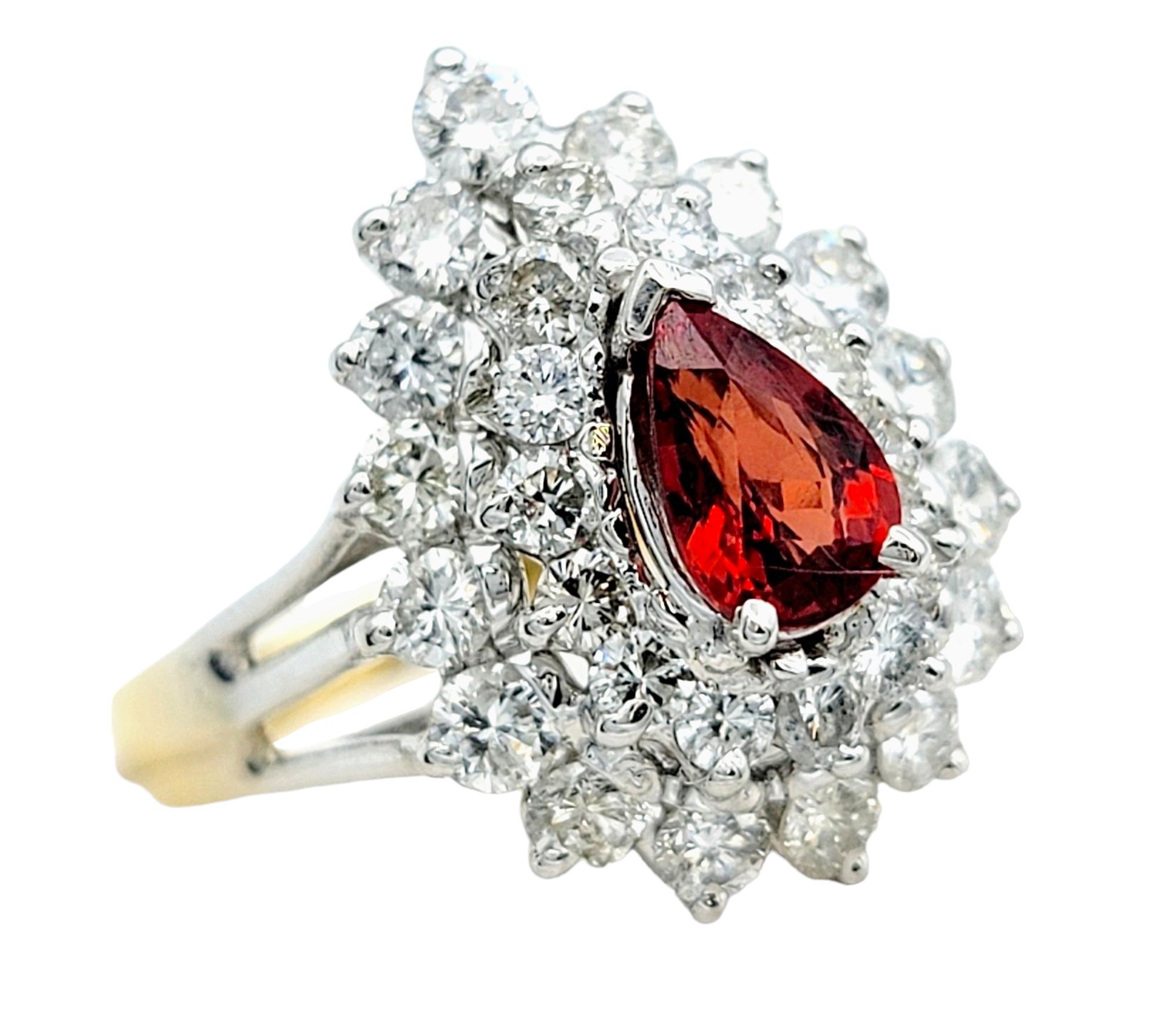 Ring Size: 8

This captivating cocktail ring showcases a stunning blend of elegance and vibrant luxury. Set in opulent 18-karat gold, the focal point of this piece is a pear-cut orange sapphire, radiating warmth and charisma. This sapphire is a
