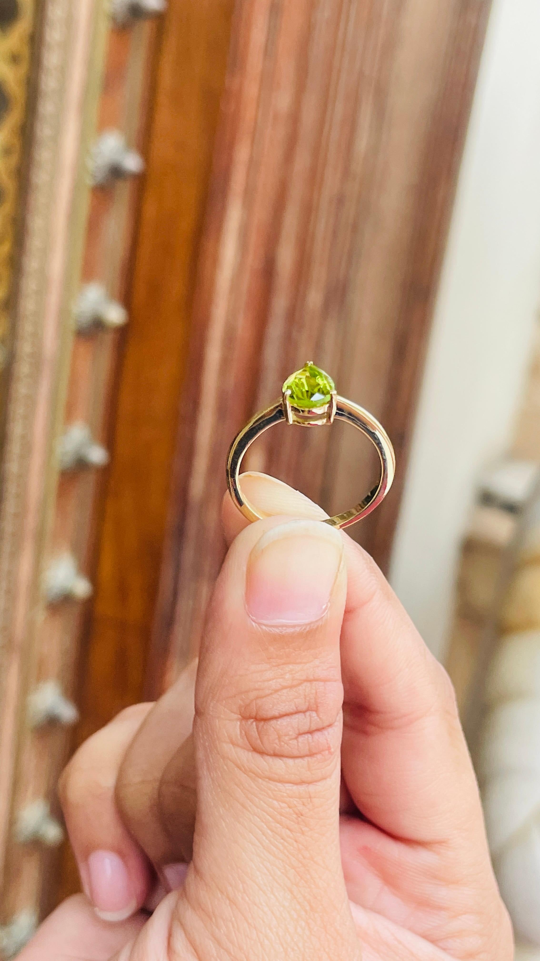 For Sale:  Pear Cut Peridot Solitaire Ring in 14K Yellow Gold 11