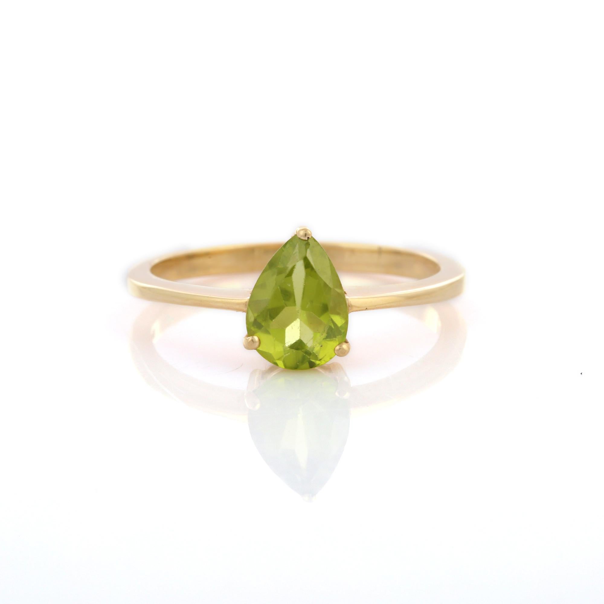 For Sale:  Pear Cut Peridot Solitaire Ring in 14K Yellow Gold 7